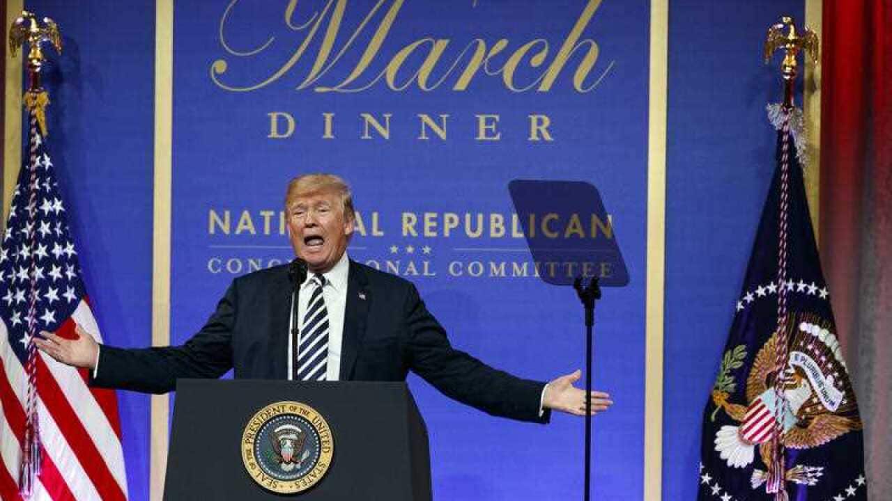 President Donald Trump speaks to the National Republican Congressional Committee March Dinner at the National Building Museum in Washington.