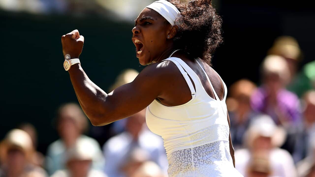 Serena Williams celebrates winning the first set against Garbine Muguruza