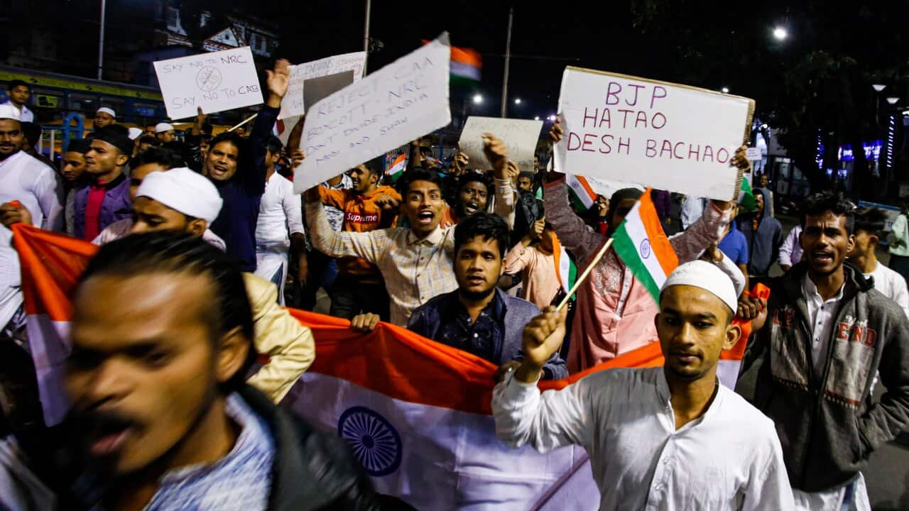 Indians shout slogans as they gather and take out a rally for a protest against the Citizenship Amendment Act.