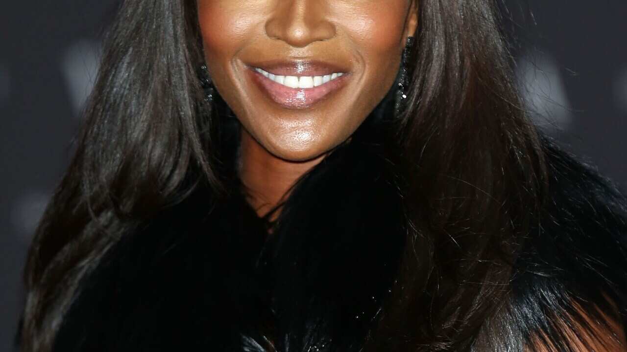 Naomi Campbell attends the preview of The Glamour of Italian Fashion exhibition at Victoria & Albert Museum on April 1, 2014 in London, England. (Tim P. Whitby/Getty)