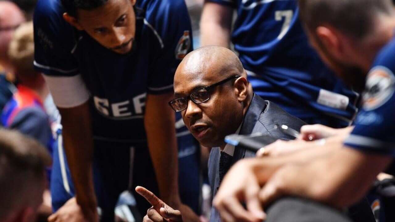 Adelaide 36ers coach Joey Wright with the team
