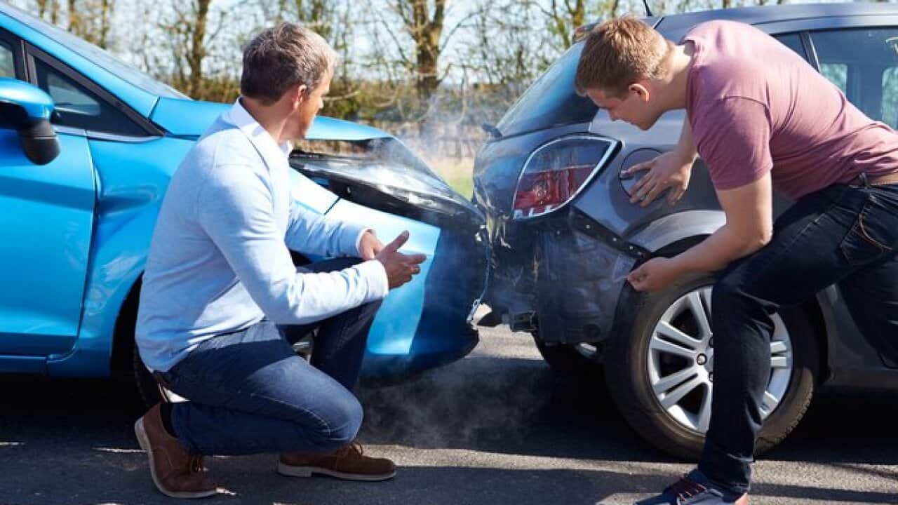 Two Drivers Arguing After Traffic Accident