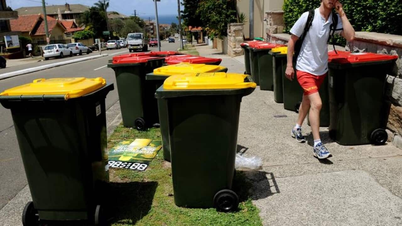 Recycling bins on a street in Melbourne.