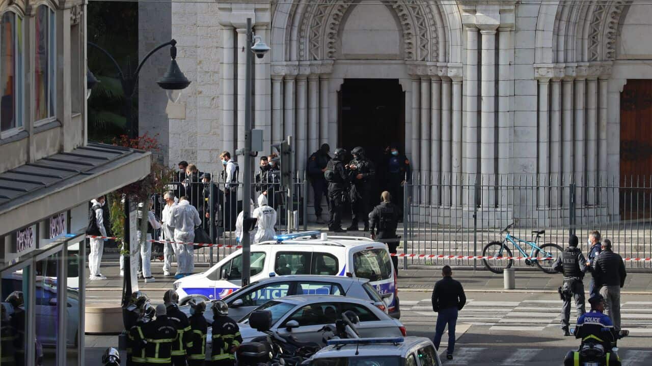 French members of the elite tactical police unit RAID enter to search the Basilica of Notre-Dame de Nice after the knife attack.