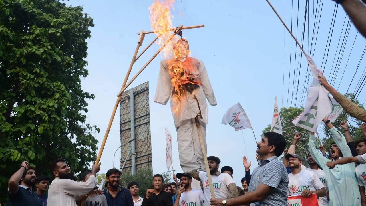 Activists burns Indian PM Modi in reaction to the move by India to abolish Kashmir's special status.