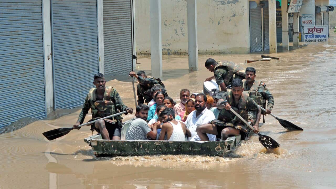 Patiala: Army personnel rescue people stuck in the flood-affected Sanauri Adda