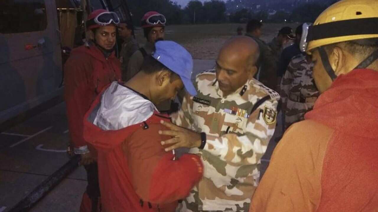 A file image of border police preparing to mount an aerial search