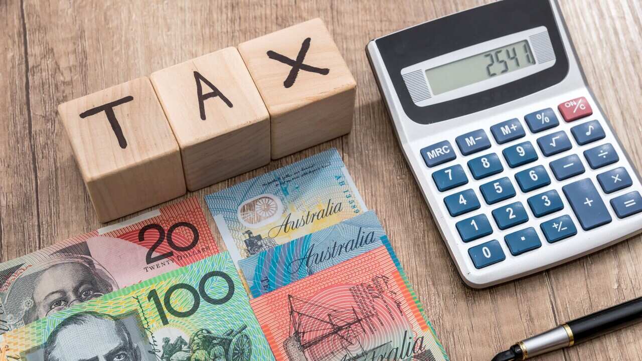 Wooden cubes with text tax australian dollar