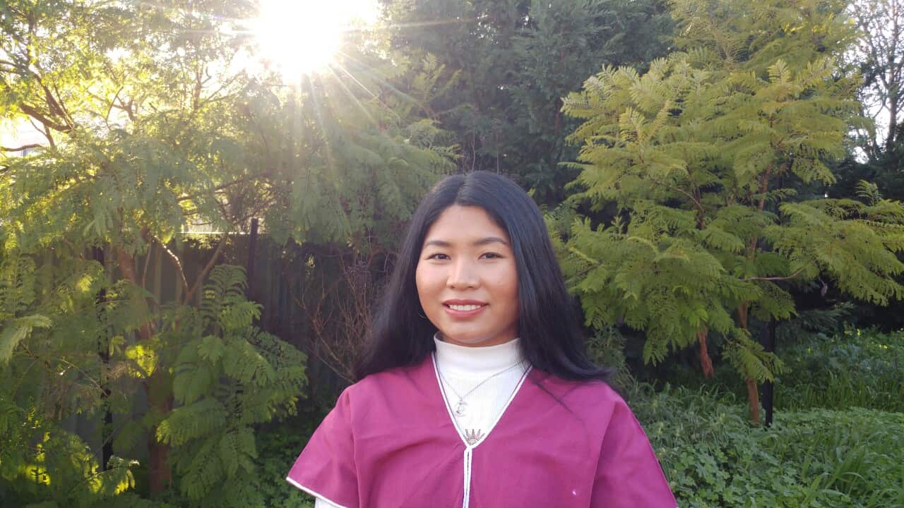 photograph of Ku Htee in garden