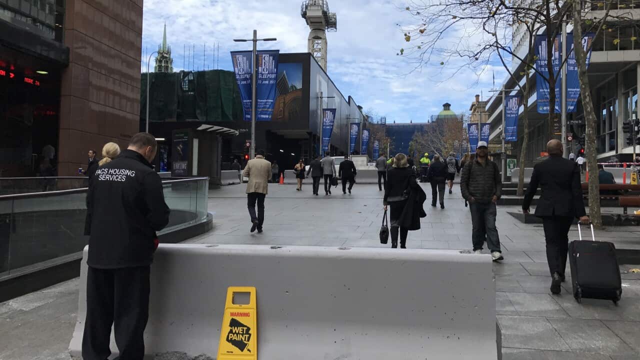 Barriers erected on the sidewalks of Martin Place