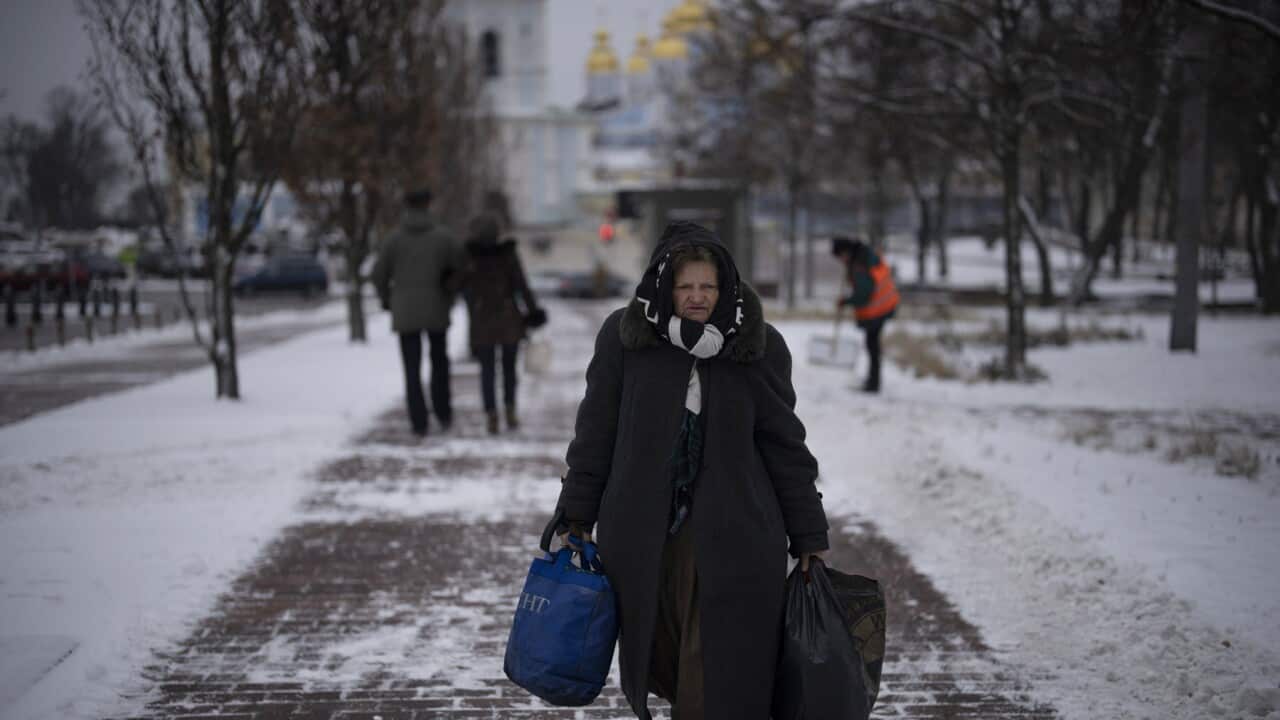 A woman walks in central Kyiv, Ukraine.jpg