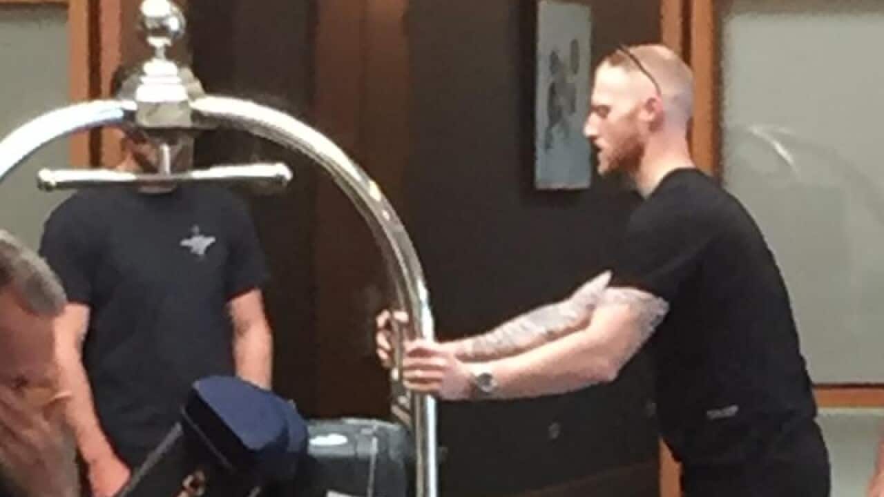 England cricketer Ben Stokes pushes a hotel trolley in New Zealand.