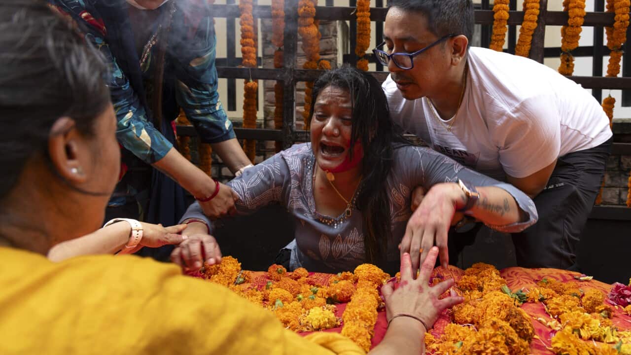 The mother of Rashik Khadiwoda, who was killed during the Gen-Z protest, breaks down in tears while paying her last respects in Kathmandu, Nepal, 16 September 2025. Rashik was killed during the Gen-Z protest on 08 September 2025.
