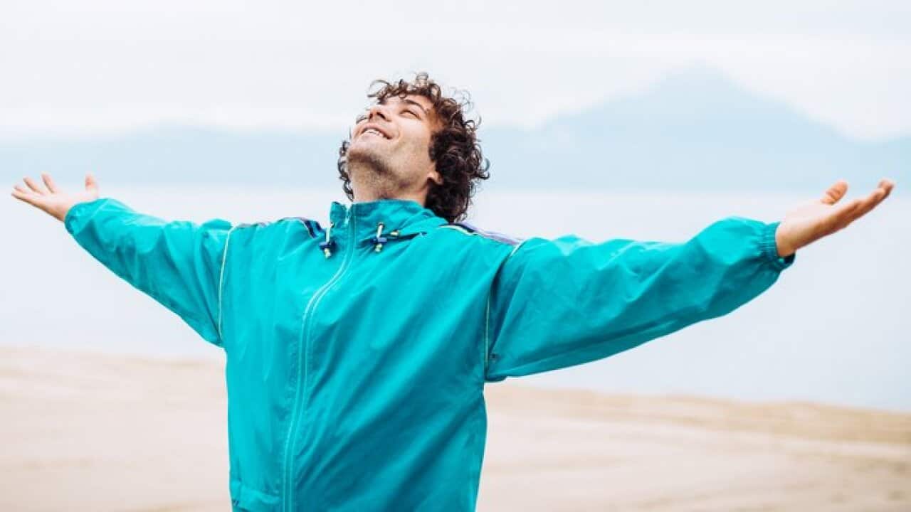 Breathing exercise on the sea shore