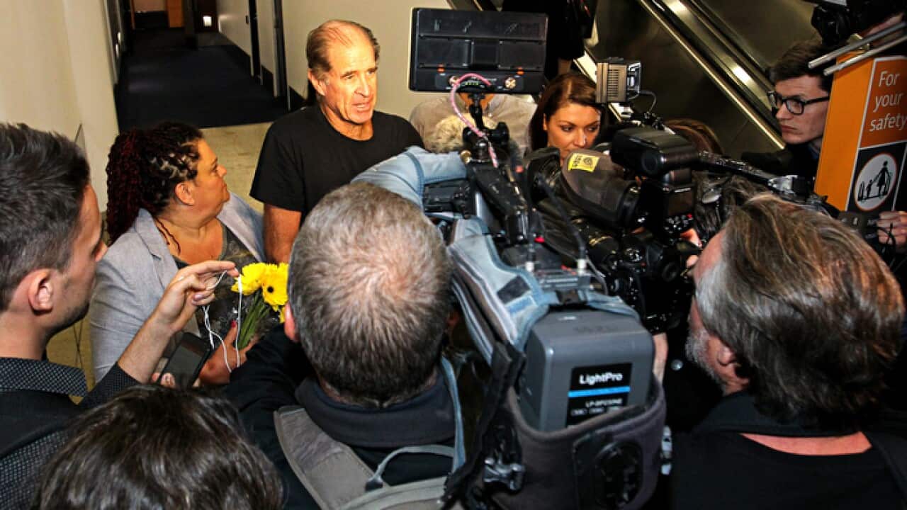 James Ricketson talks with the media at Sydney airport