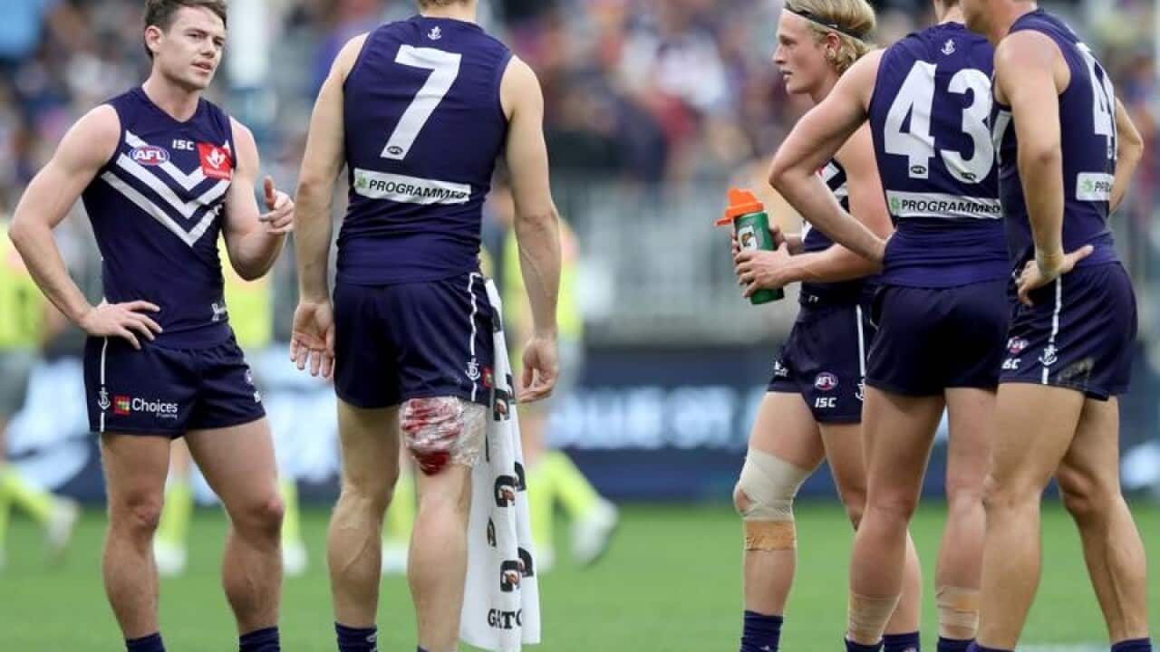 An injured Nat Fyfe of the Dockers