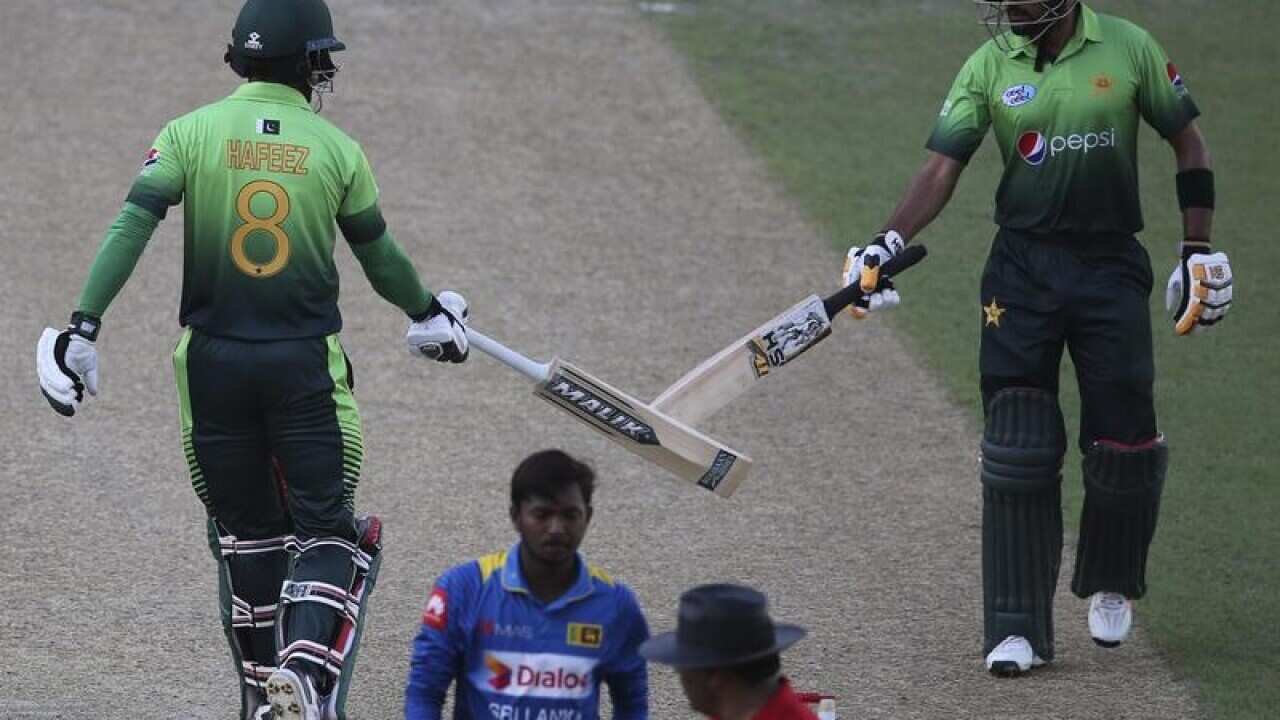 Mohammad Hafeez and Babar Azam.