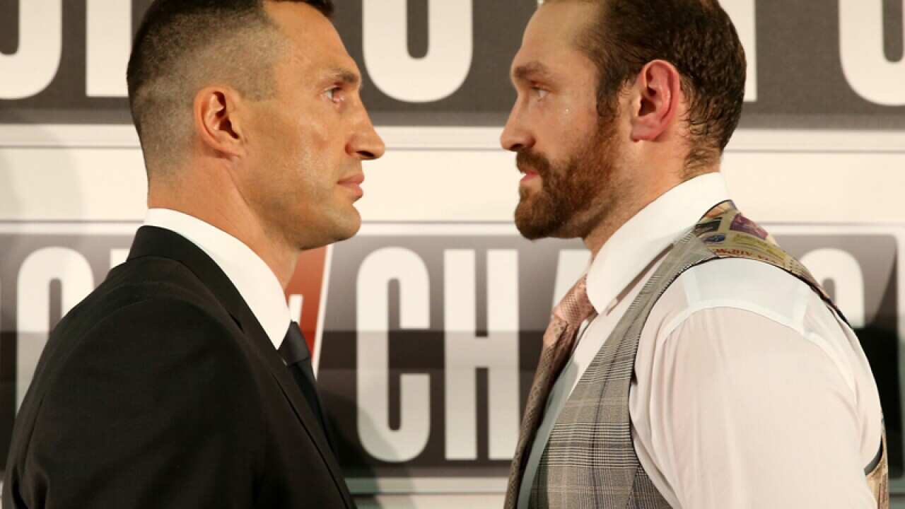 Wladimir Klitschko (left) and Tyson Fury.