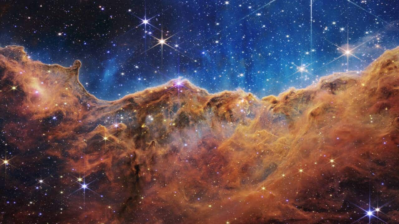 The telescope captured the "Cosmic Cliffs" of the Carina Nebula.