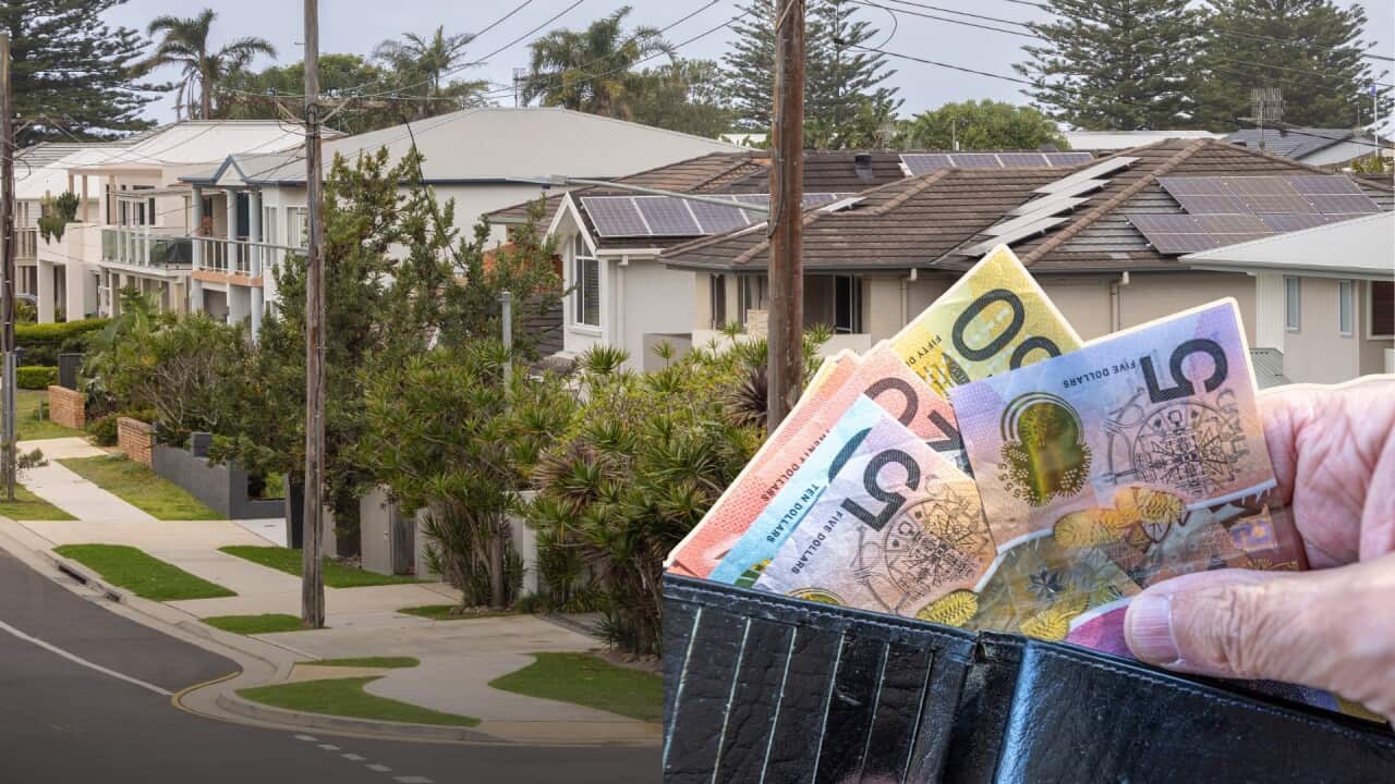 An Australian street, superimposed with a person's hand holding some Australian notes.