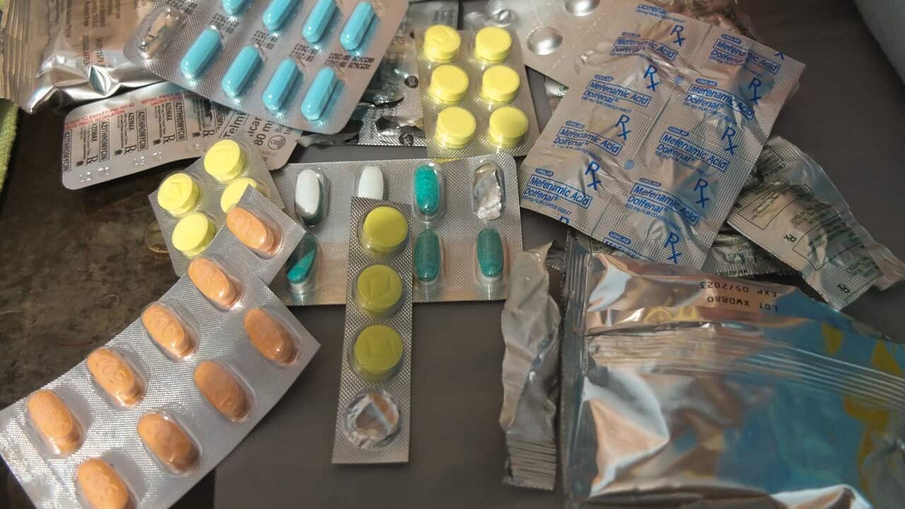 Different kinds of Paracetamol medicines displayed on a table