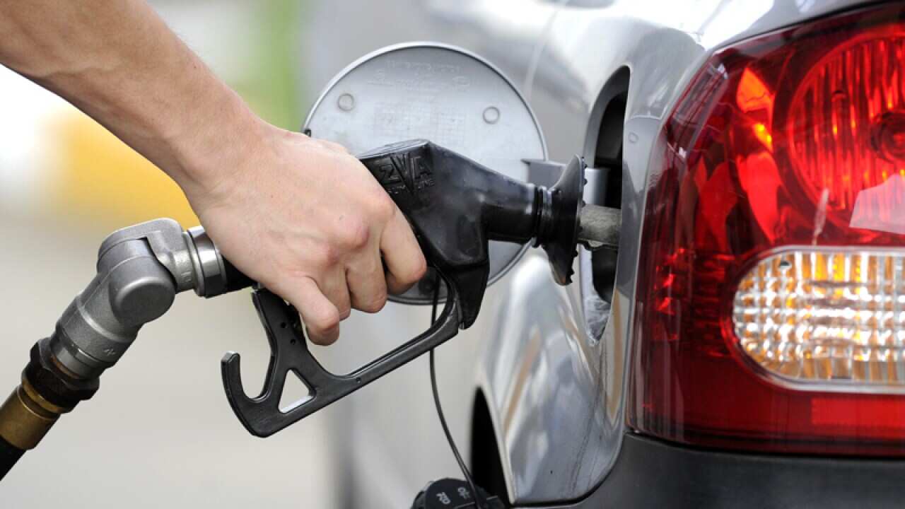 A motorist pimps fuel in Melbourne