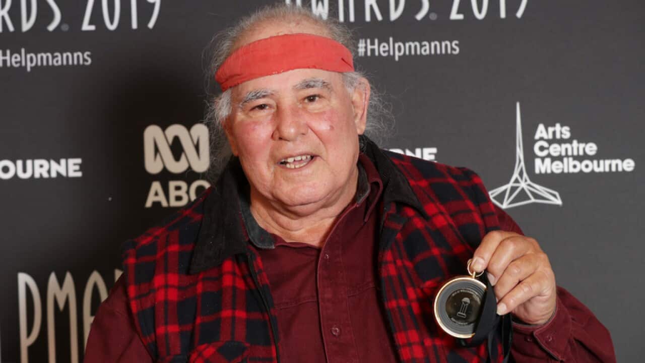 Kev Carmody poses with the JC Williamson Award at the Helpmann Awards