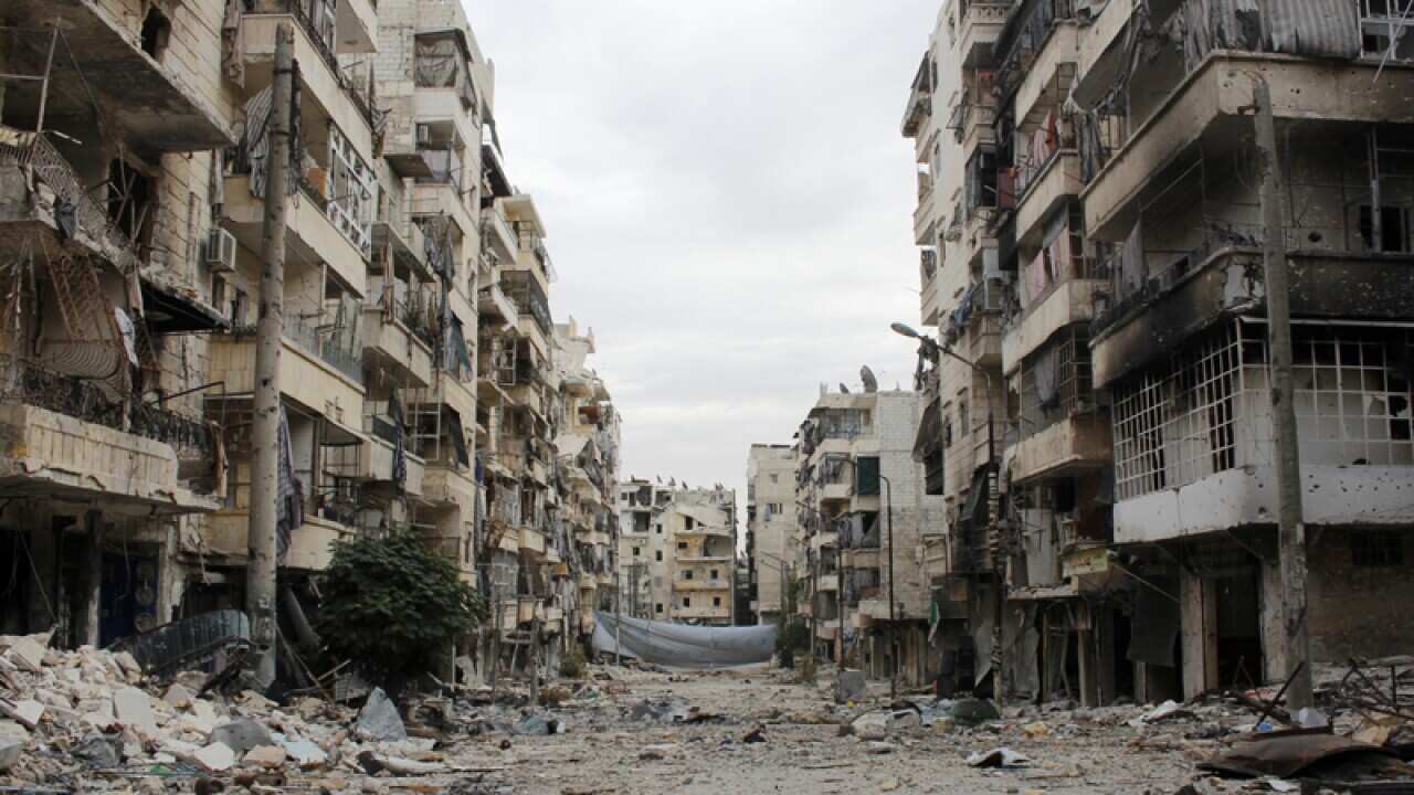 Damaged buildings in the Salah al-Din neighbourhood of Aleppo