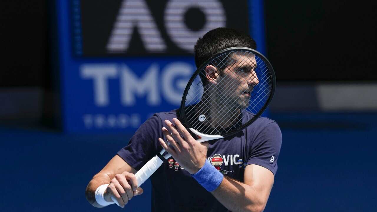 Novak Djokovic practices on Rod Laver Arena in Melbourne on 12 January 2022.