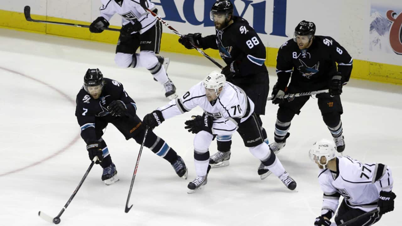 San Jose Sharks' players against Los Angeles Kings' players