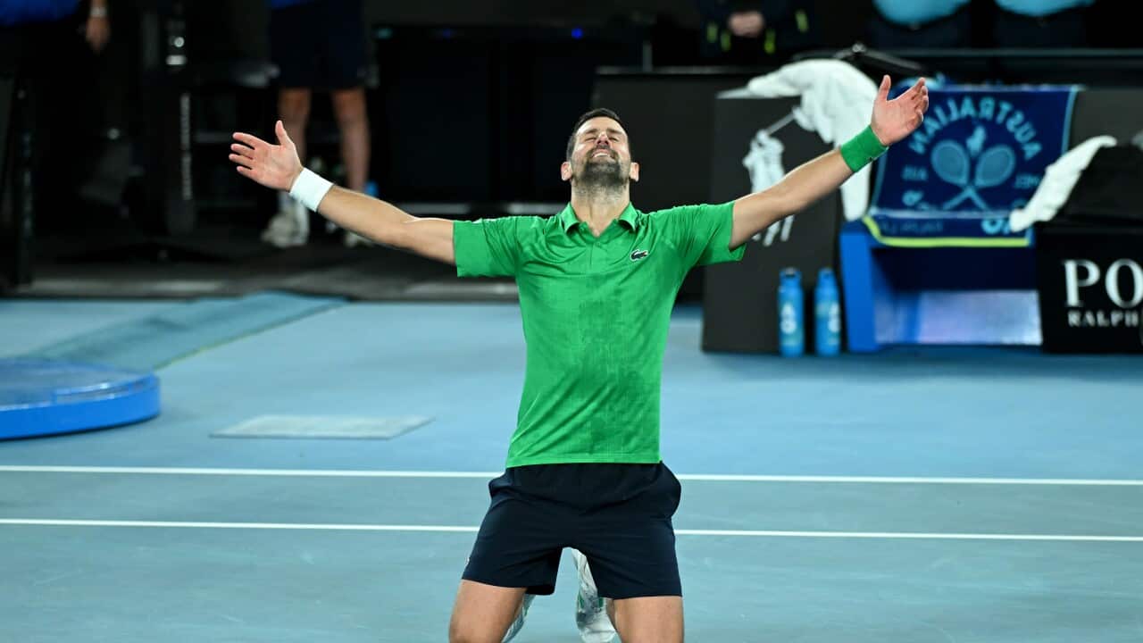 Novak Djokovic of Serbia celebrates match point during the men’s semifinal against Jannik Sinner of Italy on day 13 of the 2026 Australian Open tennis tournament at Melbourne Park in Melbourne, Saturday, January 31, 2026.