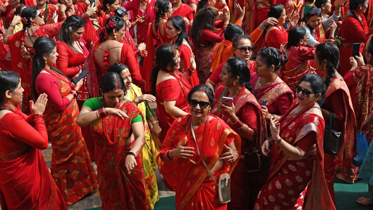 Women dancing during a Teej celebration in Nepal.