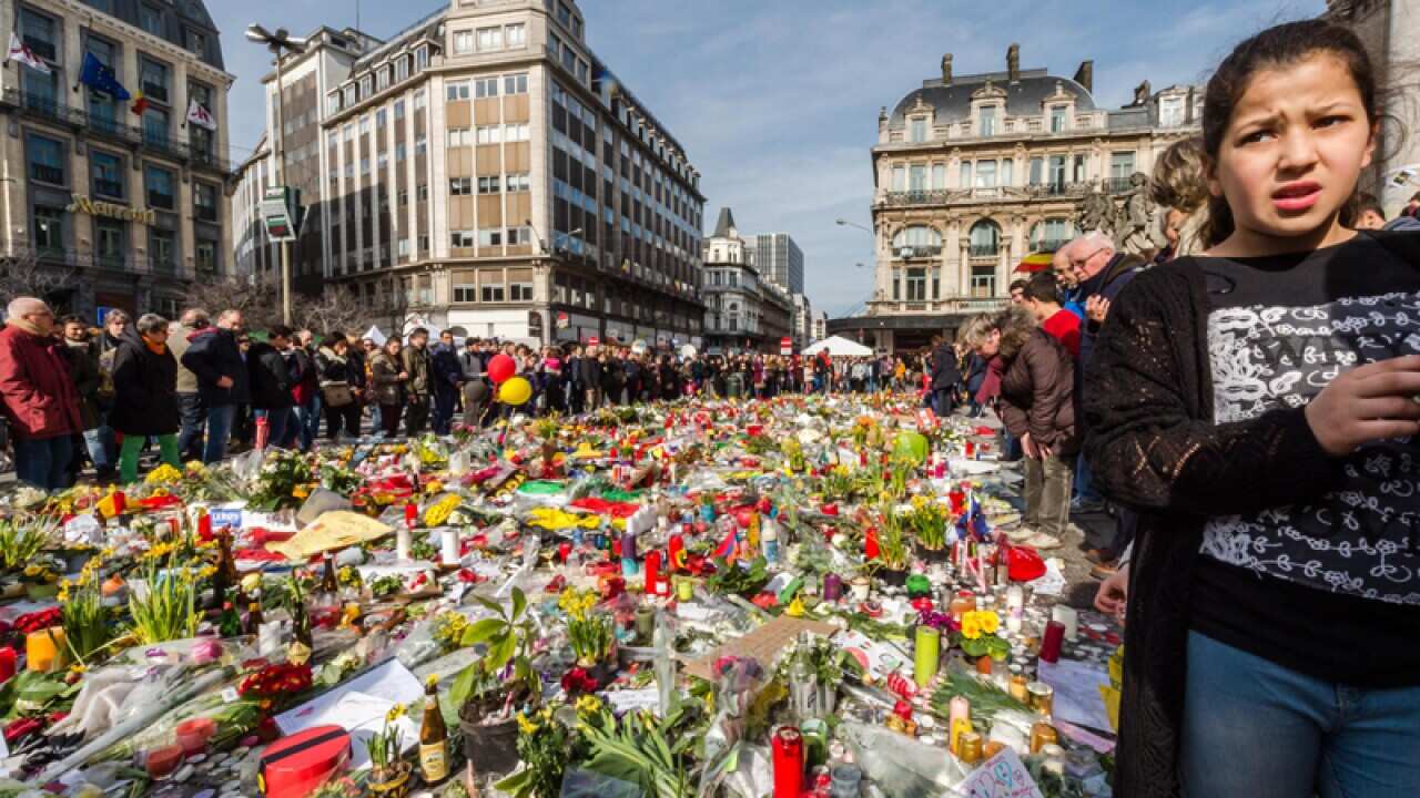 Tributes are seen at a memorial site to the Brussels suicide attacks