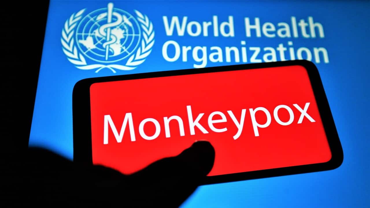 In this photo illustration, Monkeypox word is seen on the screen of a smartphone and the World Health Organization (WHO) logo in the background. (Photo by Pavlo Gonchar / SOPA Images/Sipa USA)