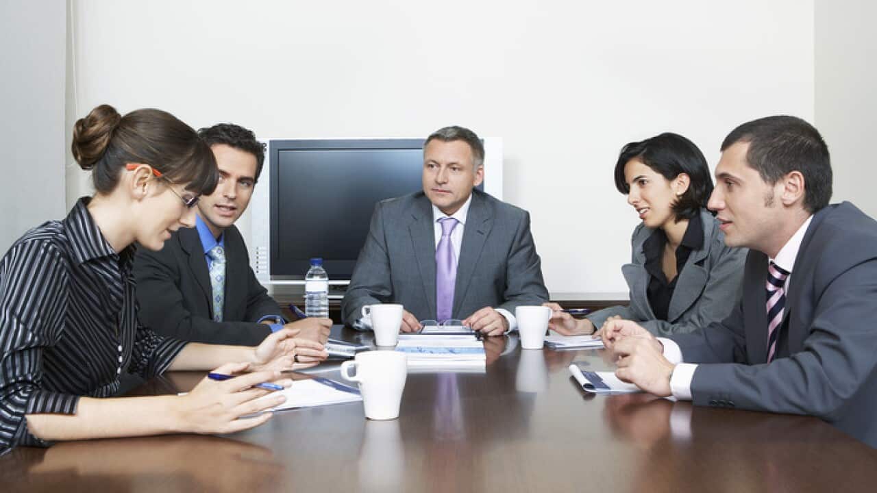 Businesspeople having meeting in office