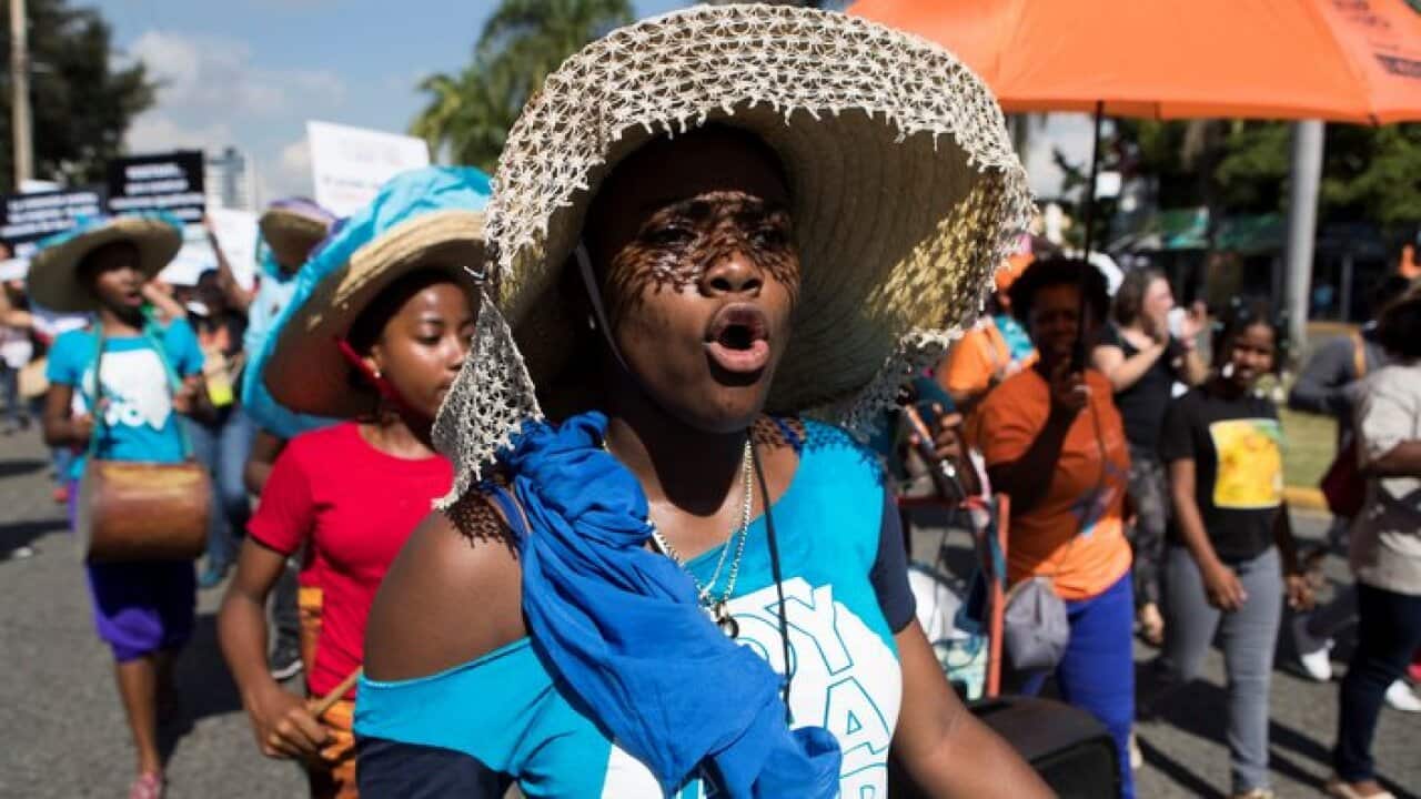 Marching for the International Day for the Elimination of Violence against Women