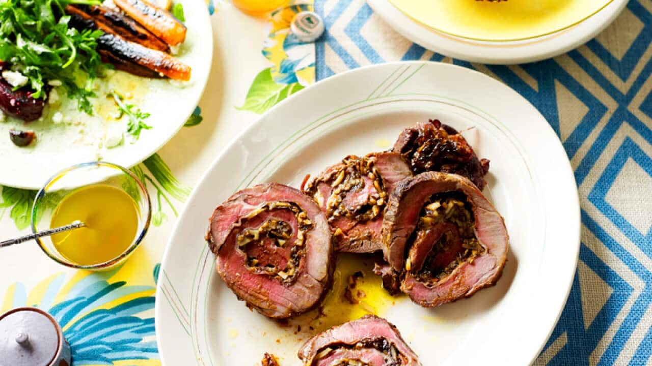 Roast lamb leg with brandy prunes and pancetta
