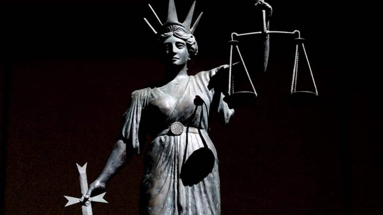 Stock picture of a statue of 'Lady Justice' or Themis, the Greek God of Justice, outside the Supreme Court in Brisbane, Tuesday, April 28, 2009. (AAP Image/Dave Hunt) NO ARCHIVING