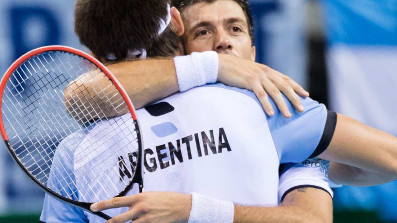 Argentina's Carlos Berlocq, right, and Leonardo Mayer celebrate