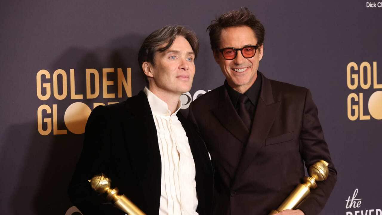 Cillian Murphy, winner of the Best Performance by a Male Actor in a Motion Picture Drama for "Oppenheimer," and Robert Downey Jr., winner of the Best Performance by a Male Actor in a Supporting Role in any Motion Picture award for "Oppenheimer," pose in the press room during the 81st Annual Golden Globe Awards at The Beverly Hilton on January 07, 2024 in Beverly Hills, California.