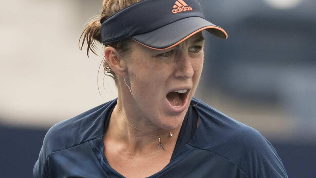 Anastasia Pavlyuchenkova of Russia reacts while in action