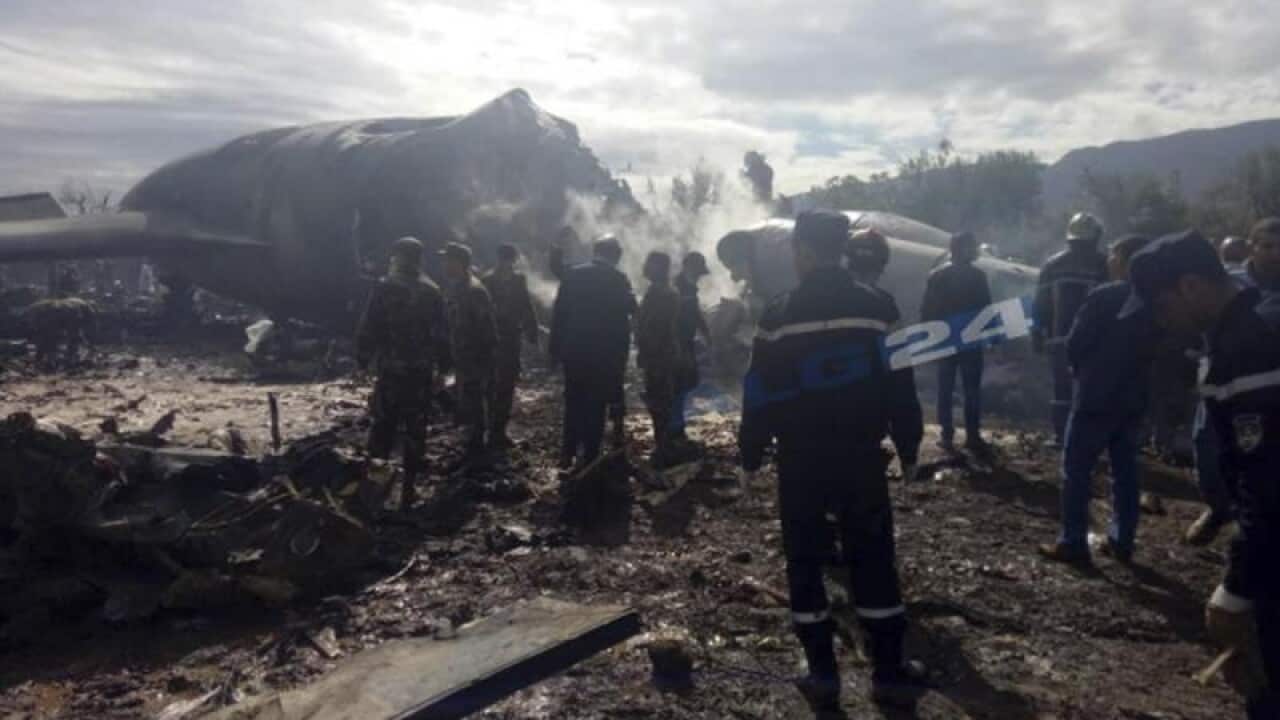 Emergency workers at plane crash site, Algeria