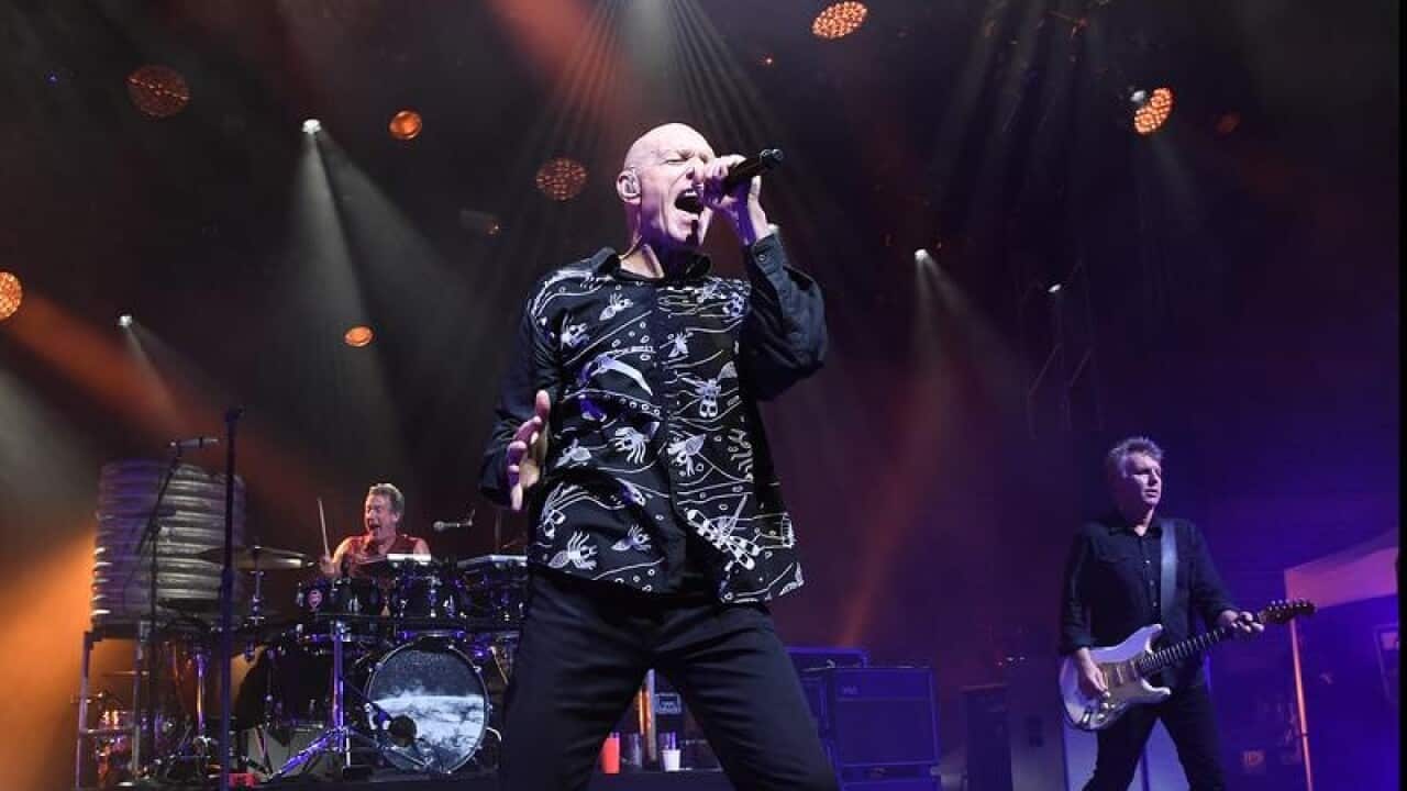 File picture of Midnight Oil performing in Brisbane.