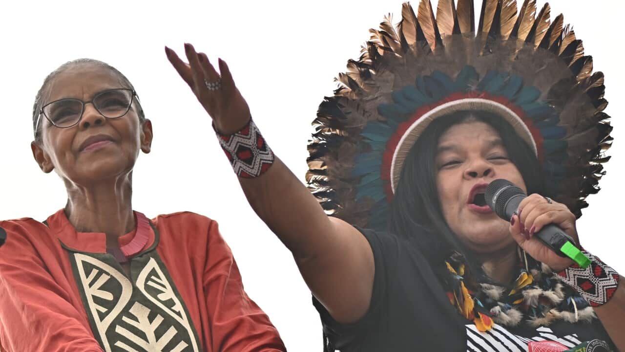 Brazilian Environment Minister Marina Silva (L) and Minister of Indigenous Peoples Sonia Guadalajara (R) attend the Global Climate March in defense of forests, indigenous land rights and global climate responsibility in Belem, Brazil, 15 November 2025.