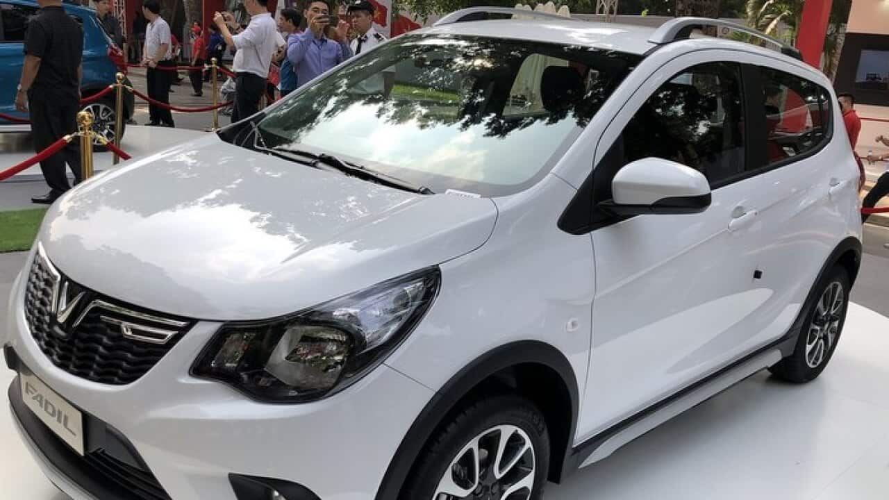 A VinFast Fadil white sedan