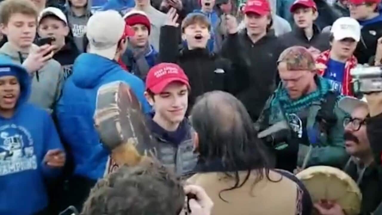 US students mock a Native American at Washington rally