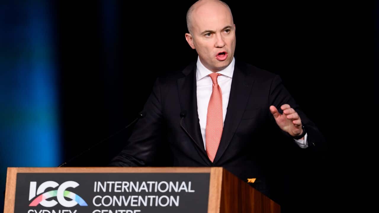 Matt Kean speaking from a podium