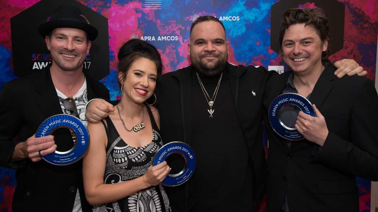 Members of Uncanny Valley with indigenous rapper Briggs