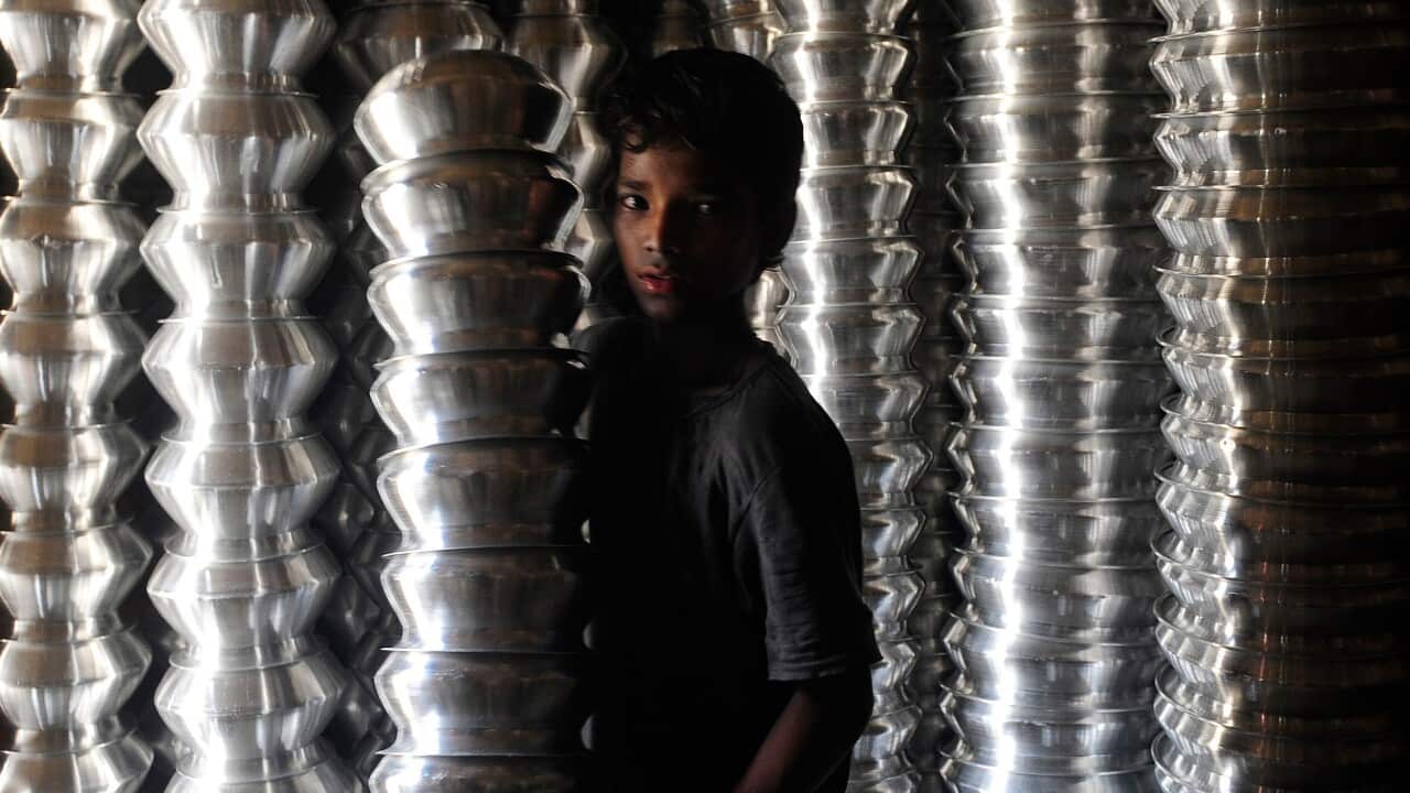 A Bangladeshi boy working in a pot making factory - Getty-1.jpg