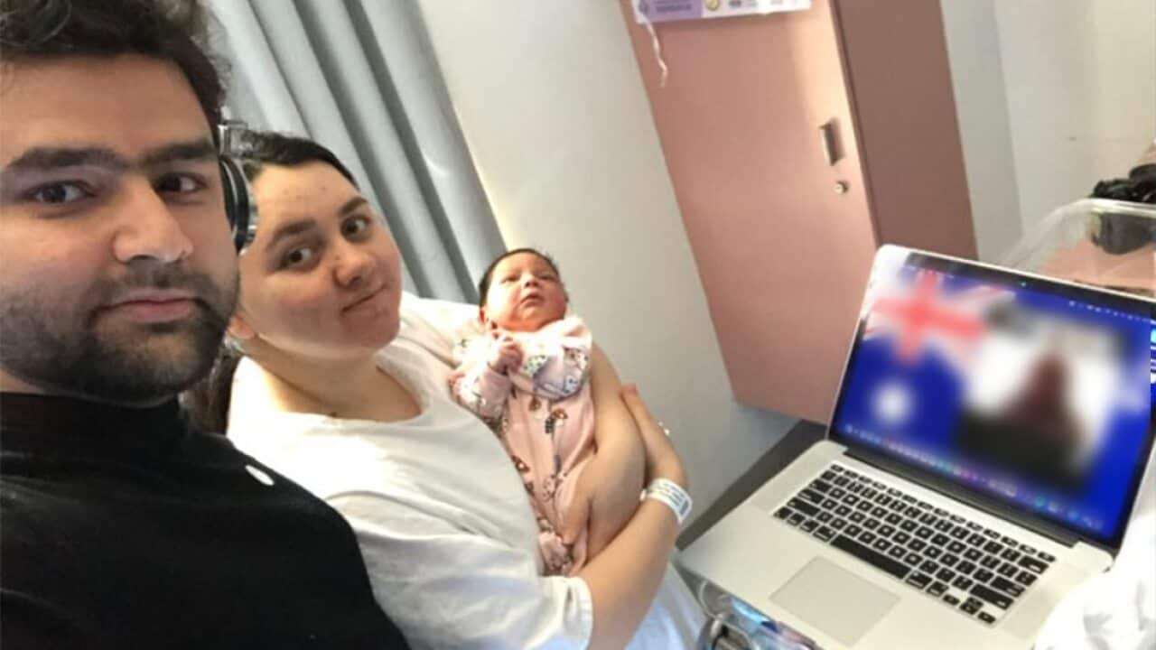Fadi Albehnonissan attending his citizenship ceremony with his wife and newborn daughter